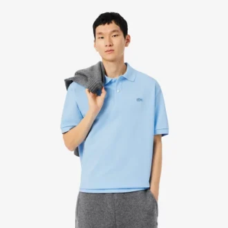 Polo masculino de corte largo em piqué pesado