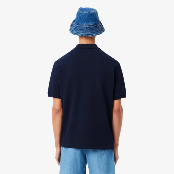 Polo masculino de corte largo em piqué pesado