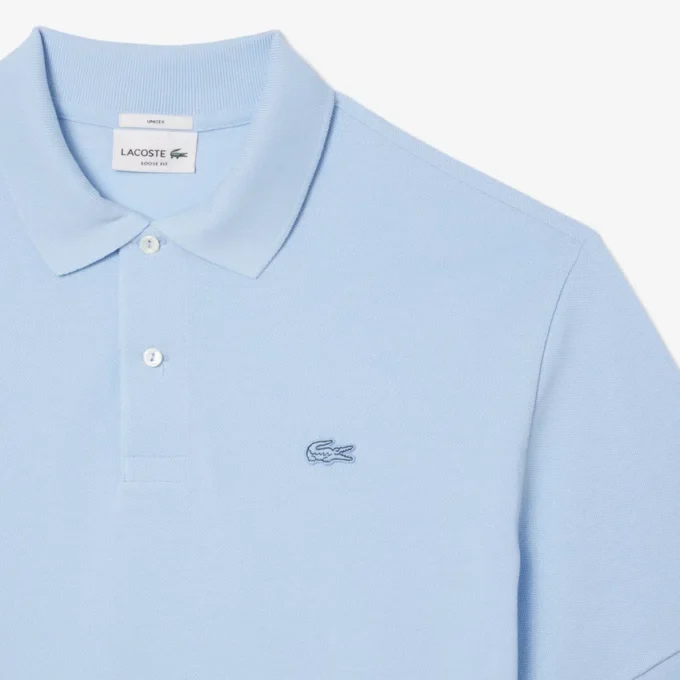 Polo masculino de corte largo em piqué pesado