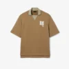 Polo oversized em cetim com detalhe de emblema da passerelle