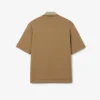 Polo oversized em cetim com detalhe de emblema da passerelle