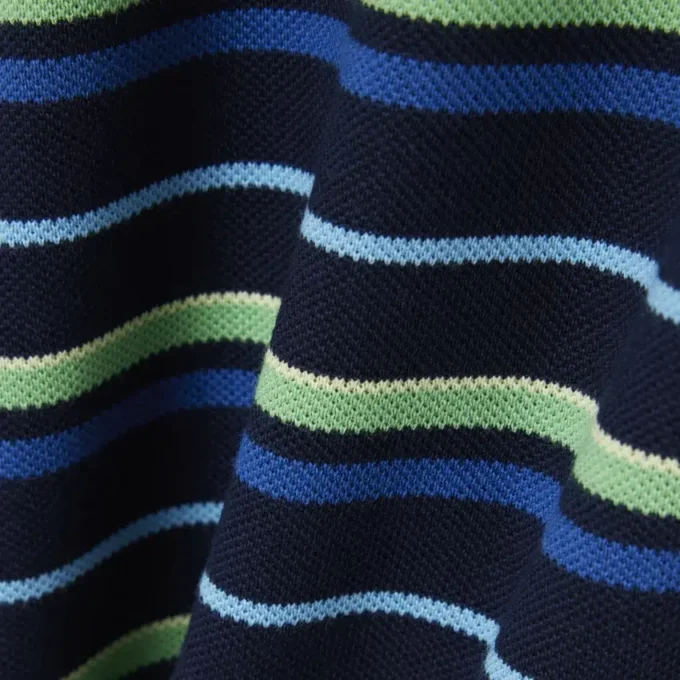 Polo Petit Piqué com riscas contrastantes para rapaz