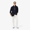 Polo Piqua com blocos de cor e corte regular