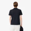 Polo Piqua com blocos de cor e corte regular