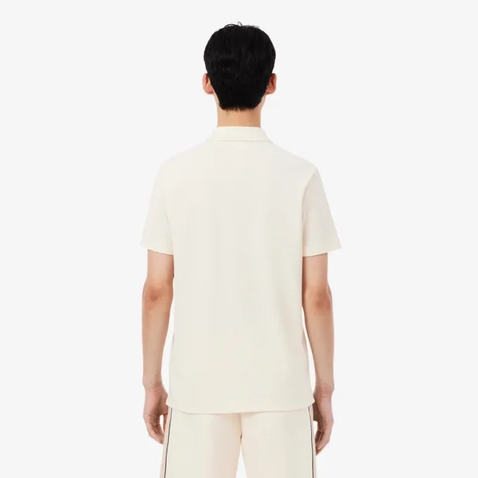 Polo Piqua com blocos de cor e corte regular