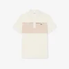 Polo Piqua com blocos de cor e corte regular