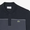 Polo Piqua com blocos de cor e corte regular