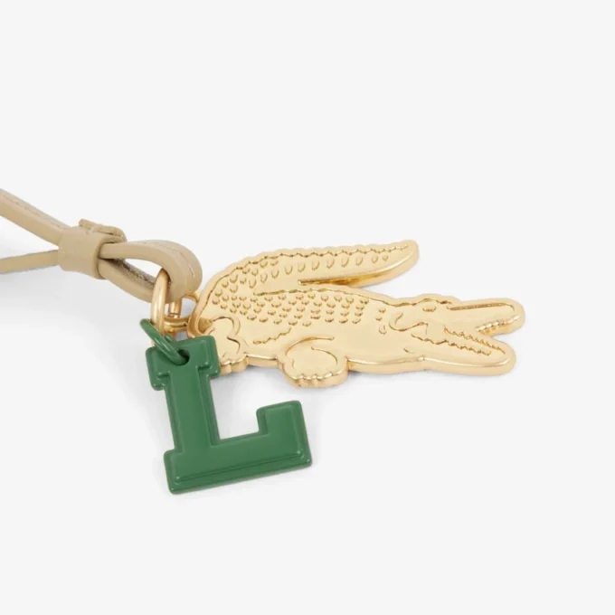 Porta-chaves com pingente em forma de raquete de ténis e espelho L