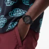 Relógio Lacoste.12.12 Chrono em silicone preto e dourado cravo