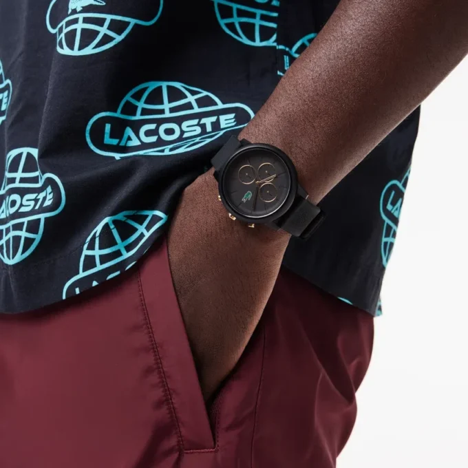 Relógio Lacoste.12.12 Chrono em silicone preto e dourado cravo