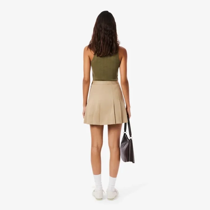 Saia curta plissada em algodão elástico para mulher