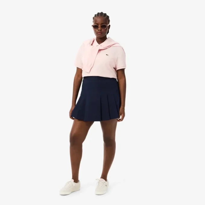 Saia curta plissada em algodão elástico para mulher