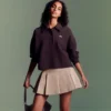 Saia curta plissada em algodão elástico para mulher