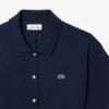 Vestido polo mini-piqué com corte evasê para mulher